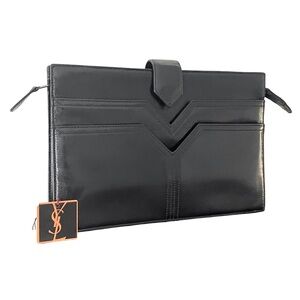 Yves Saint Laurent vintage black leather clutch bag with tags
